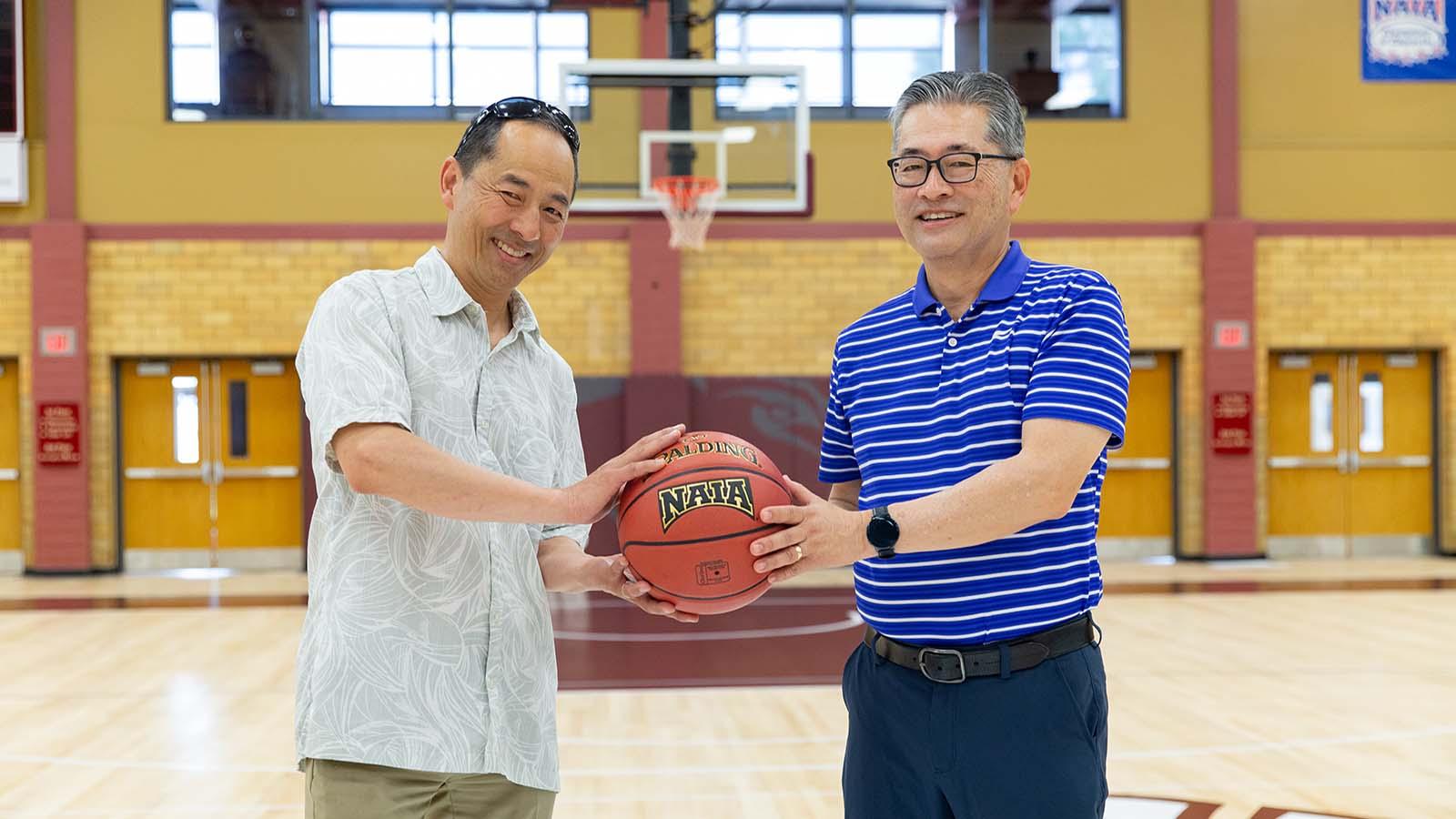 Troy and Jon Kaji were able to visit Allee Gymnasium and shoot a few hoops in the gym where their dad once played.